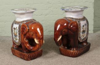 A large pair of pottery elephant plant stands. Height 55cm.