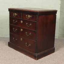 A carved oak and pine two over three chest of drawers of small proportions. (77cm x 79cm x 47cm)