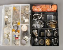 Two boxes of assorted watch spares and accessories, to include straps, glasses and movements.