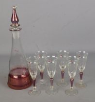 A Nagel West German 'Exklusiv Design' art glass decanter and six glasses.