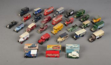 A box of assorted diecast vehicles to include boxed Matchbox Model 'A' Ford, Model 'A' Van and The