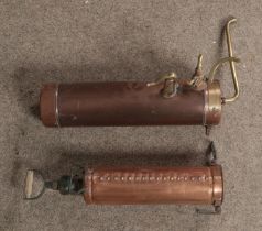 A copper and brass gas water heater together with copper and brass fire extinguisher