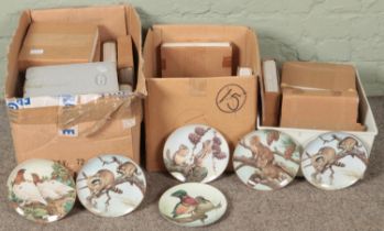 Three boxes of boxed animal cabinet plates. Includes The Forest Year examples, etc.