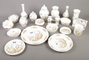 A quantity of Aynsley ceramics. Mostly in the 'Cottage Garden' design.