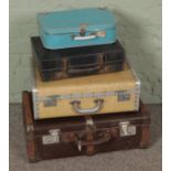 Four vintage suitcases, including wooden bound example stamped 22595383 CFN Nicholson and
