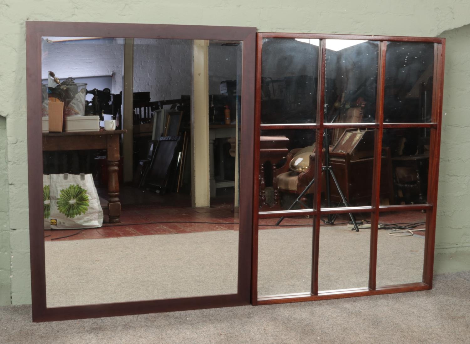 Two very large decorative wooden mirrors. Largest 101cm x 86cm.
