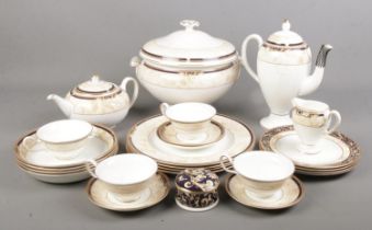 A quantity of Wedgwood Cornucopia tea/dinnerwares. Includes teapot, tureen, coffee pot, cups &