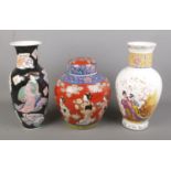 Two Oriental vases along with a large Chinese lidded jar. Largest vase 37cm. White vase cracked.