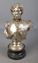 A cast metal bust of Nelson on stand. (36cm) Appears to be missing plaque. No other visible signs of