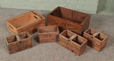 A collection of wooden advertising crates, mainly fishing themed. To include Mackerel, Monk Fish,