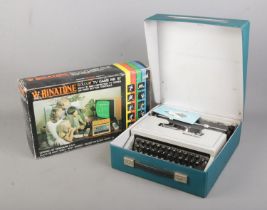 A vintage Binatone MK10 in original box together with an Olivetti Dora portable typewriter.