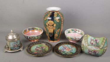 A quantity of Fantasia style ceramics. Includes two plates, bowl, lidded jar, large Regency