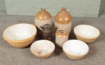 A collection of stoneware and ceramics, to include flagons, white metal jug and a series of Mason