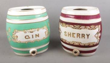 A ceramic gin barrel together with sherry example