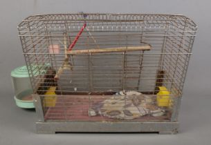 A vintage bird cage. (35cm x 58cm x 33cm)