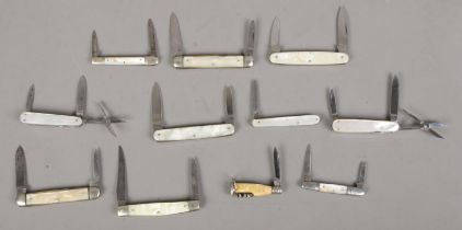 Eleven pocket knives with mother of pearl handles. Includes Hudson Knife Co, George Wostenholm,