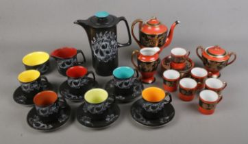 A crown Devon Harlequin coffee set including six cups and saucers, sugar bowl, milk jug and coffee