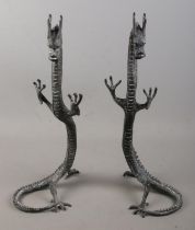 A pair of Japanese bronze stylised dragons. (40.5cm)