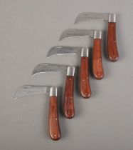 Five Flubenvet pruning knives.