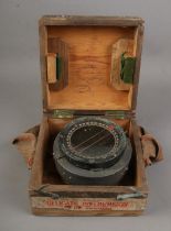 An Air Ministry marked Type P8 Compass and original wooden carry case.