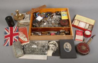 A tray of collectables. Includes coins, lighters, Constantia tape measure, Durbarry compact,