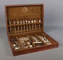 A wooden cased six place Thai gilt metal canteen of cutlery, with the handles formed as bamboo