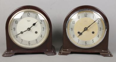 Two Smiths Enfield bakelite clocks. One in need of restoration.