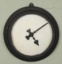 A large black painted metal mechanical wall clock. (Diameter of face 42cm).