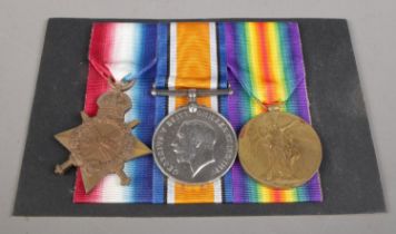 A WWI trio of medals, awarded to Corporal Lieutenant Joseph Burns, 11497, Manchester Regiment.