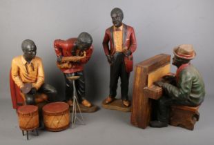 A large set of four composite jazz band musicians. Singer Height 64cm