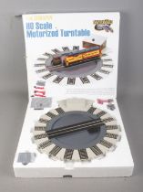 A boxed Bachmann HO scale motorized turntable.