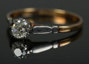 An 18ct gold and platinum diamond solitaire ring approx. .5 carat. Size Q, 1.9g.