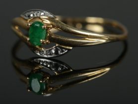 An 18ct gold ring set with single emerald. Size OÂ½, 1g.