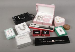 A quantity of costume jewellery including Limit gift set including watch, bracelet and pendant