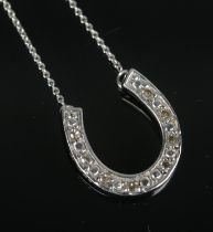 A 9ct white gold and diamond set horseshoe necklace on chain. Total weight 2.8g.
