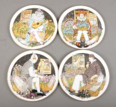 Four limited edition Royal Doulton collectors plates from the 'Behind The Masque' series.