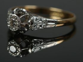 An 18ct gold solitaire ring set with single diamond. Size M, 2g.