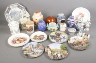 A box of assorted ceramics to include Danbury Mint cabinet plates, Ringtons, Palissy, etc.