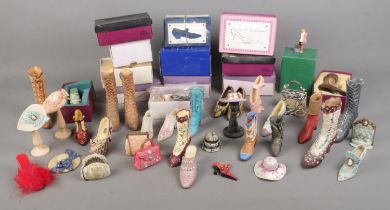 A box of composite ornaments in the form of shoes, hats and handbags to include a large quantity