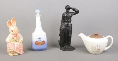 Four pieces of mainly ceramics, to include Royal Copenhagen decanter depicting Egeskov castle and