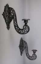 A pair of cast iron black wall mounted sconces Hx50cm approx