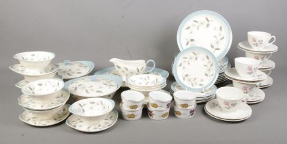 A collection of part dinner services, to include Wedgwood Penshurst, Royal Doulton Pillar Rose and
