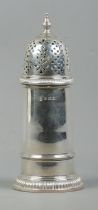 A George V sugar shaker, with finial top. Assayed for Birmingham, 1934, by Barker Brothers Silver