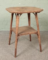 A Maple & Co bamboo occasional table. In need of attention.