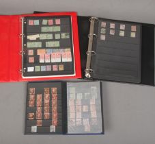 Three albums of assorted stamps featuring a good collection of Victorian examples to include sheet