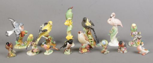 A good collection of ceramic birds, to include several Crown Staffordshire examples by J.T Jones,