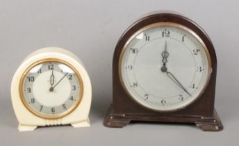 Two Smiths Enfield bakelite wind up clocks.