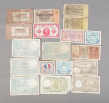 A collection of European banknotes dating between 1937 and 1944 to include Banque Nationale De