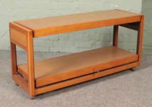 A wood and Formica metamorphic sideboard/table.