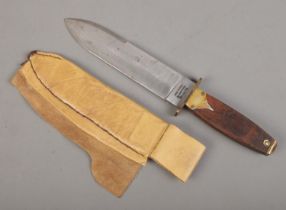 A John Nowill bowie knife with scabbard. Length of blade 20cm. CANNOT POST OVERSEAS.